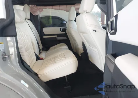 2023 Ford Bronco Wildtrak from USA, damaged, VIN 1FMEE5DP2PLC19008